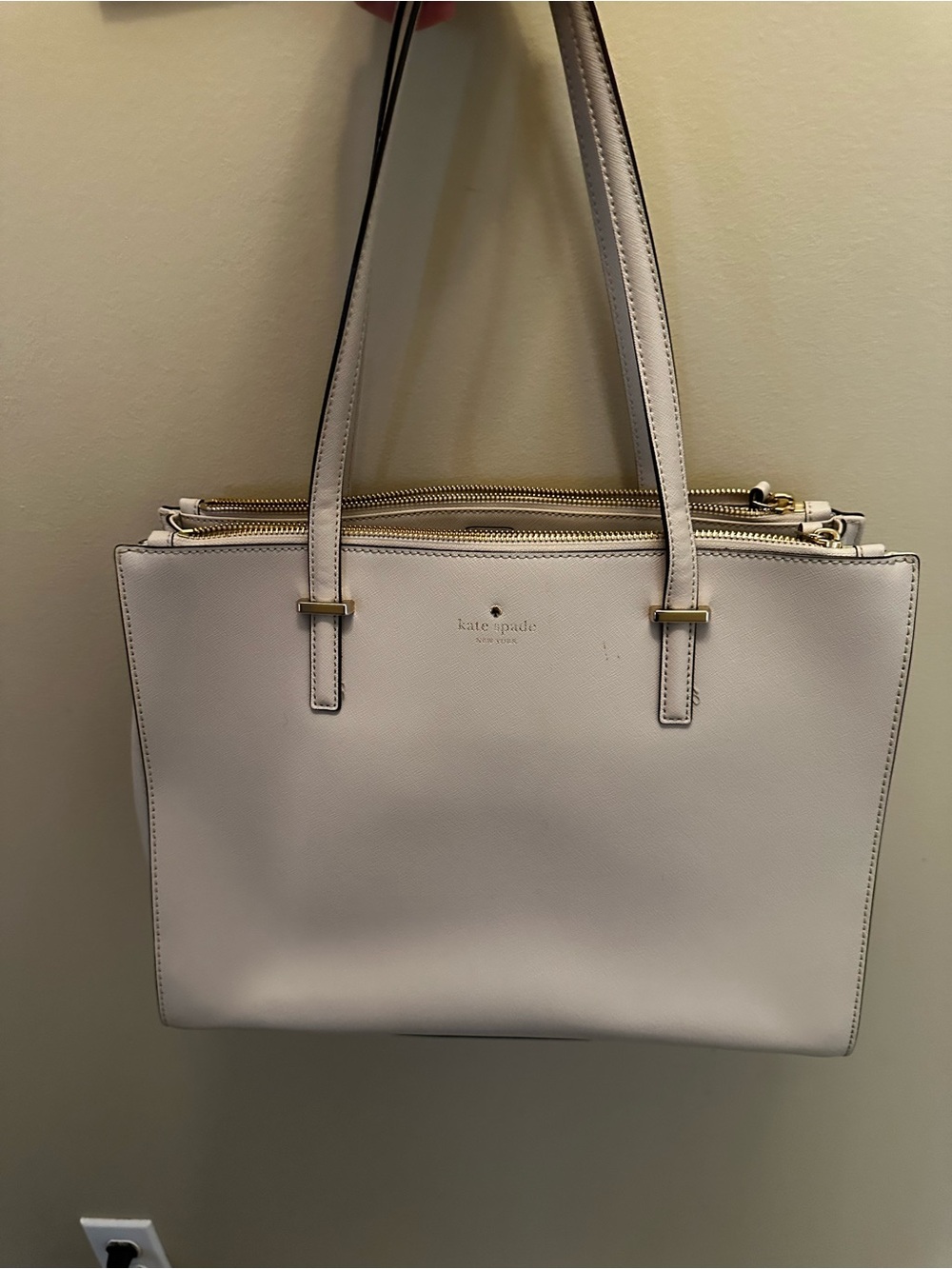 Cream kate spade tote bag